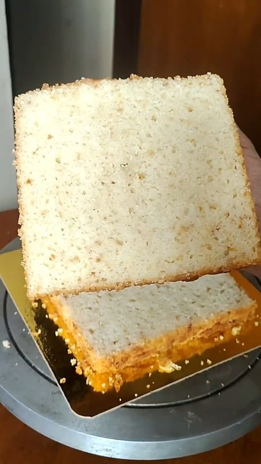 Slice of vanilla sponge showing the crumb